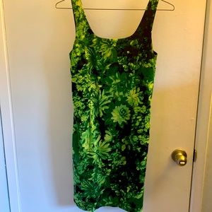 Excellent condition knee-length dress in green and black, size 4.